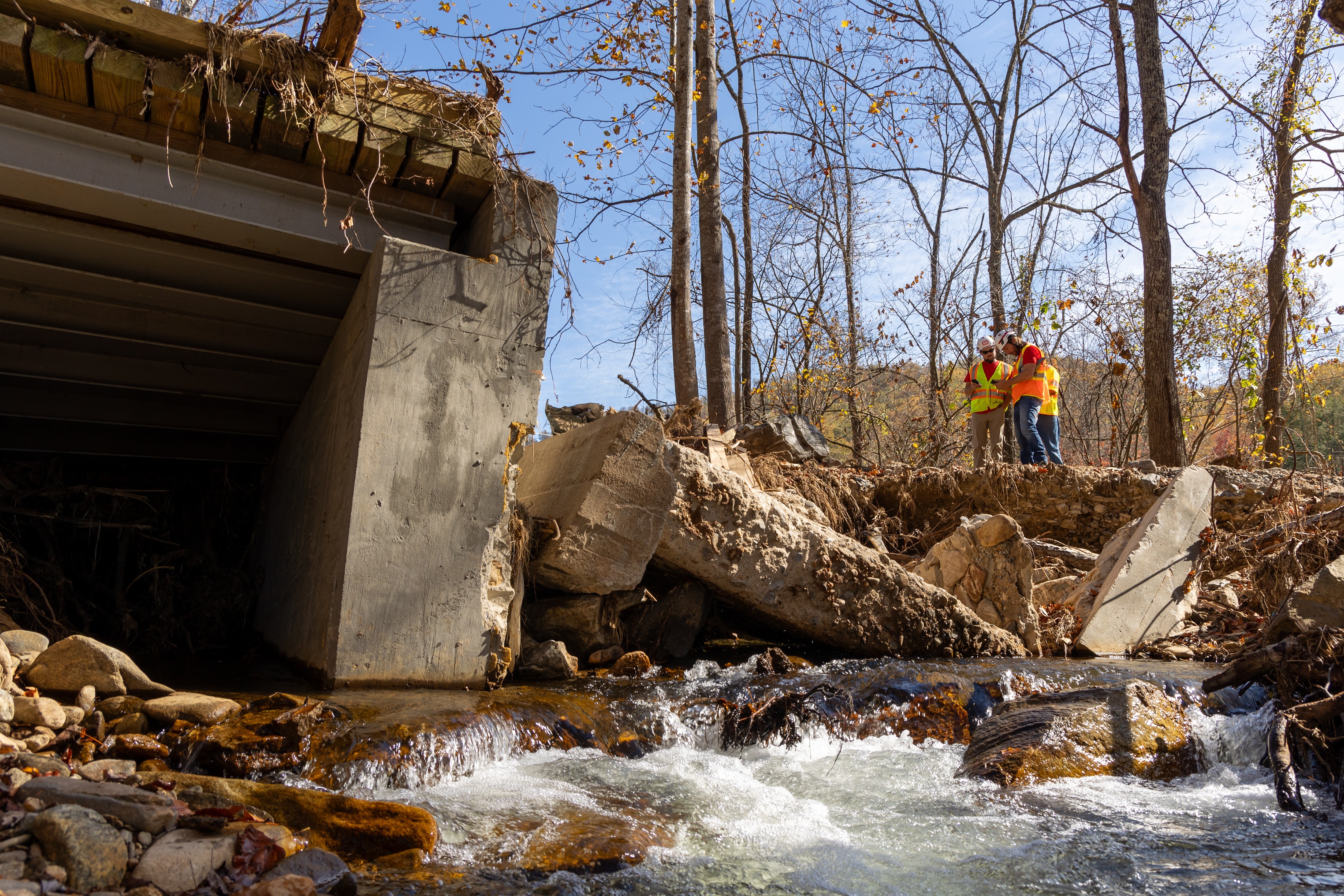 Colonel Justin R. Pabis, U.S. Army Corps of Engineers (USACE) New England District Commander, and a team of engineers inspect structural damage to a bridge in Western North Carolina on Oct. 25, 2024. The assessment is part of USACE’s mission to...