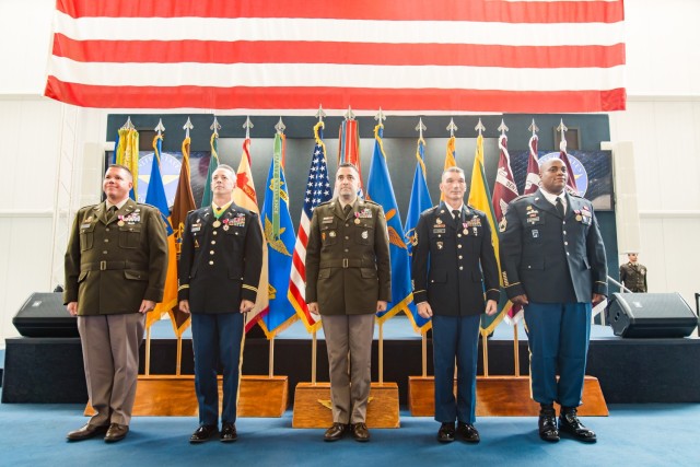 (Left to right) Chief Warrant Officer Four Michel Helland, Chief Warrant Officer Four Michel Helland, Master Sgt. Omar j. Savon, Sgt. 1st Class Roaman Johnson, and Sgt. 1st class James Tebbe retire during a ceremony inside the Army Aviation Museum...