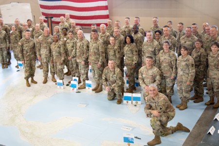 Leaders with the United States Army Reserve pose for the camera during a weeklong exercise regarding large scale mobilization operations at Fort Liberty, North Carolina, on Sept. 24, 2024. Exercises such as these foster collaboration for USAR leaders to train together, strengthen relationships between commands and identify opportunities for improvement. (U.S. Army Reserve photo by Capt. Gary Grantham)