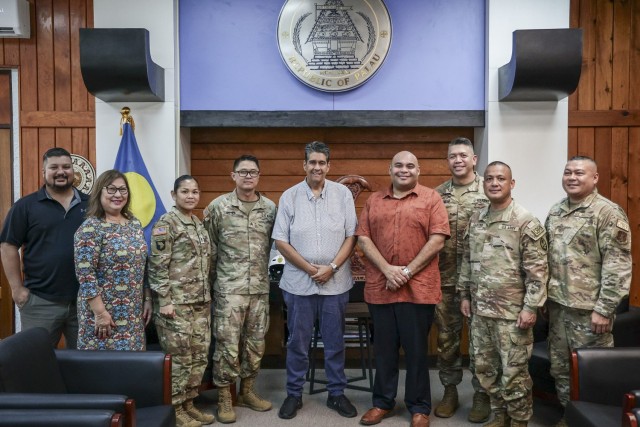 Palau President Surangel Whipps Jr., center, meets with Guam Lt. Gov. Joshua Tenorio and members of the Guam National Guard in Koror, Palau, Oct. 29, 2024. The Guam National Guard and Palau held their inaugural State Partnership Program event in Palau, sharing best practices in emergency management and planning, communications, disaster response, and more. (U.S. National Guard photo by Mark Scott)