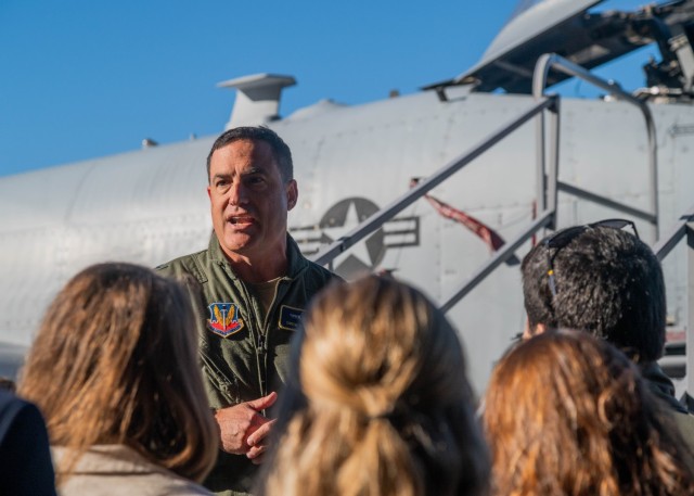 Maryland Air National Guard Brig. Gen. Drew E. Dougherty, assistant adjutant general-air of the Maryland National Guard, speaks with members of the U.S. State Department’s International Visitor Leadership Program during a visit at Martin State Air National Guard Base, Md., Oct. 25, 2024. Maryland National Guard members hosted 30 visitors and conducted briefings regarding the State Partnership Program, as well as the operational missions of the 175th Wing.