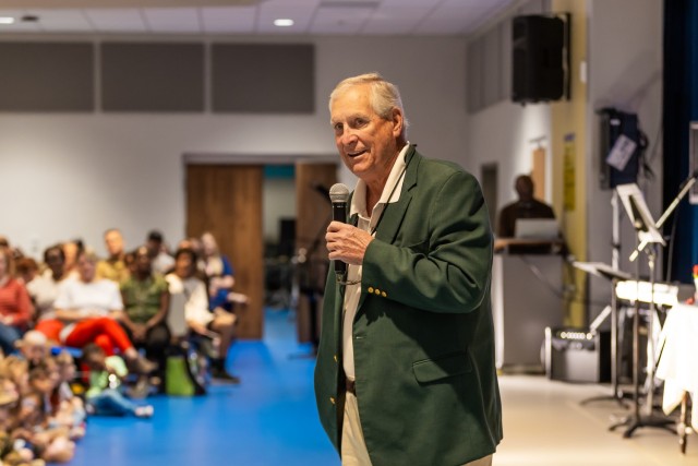 Retired Master Sgt. Bill Breeze speaks to a crowd of veterans and their families  inside the Ellis D. Parker Elementary School cafeteria on Fort Novosel during the annual Veterans Day Program Nov. 7, 2024.