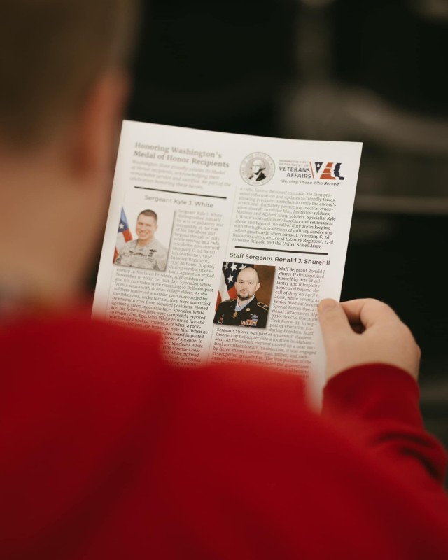 An Olympia resident looks at the biographies of Washingtonian Medal of Honor recipients, Nov. 6, 2024.