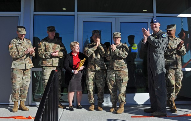 USACE and JBLM leaders celebrate the ribbon cutting ceremony for the new Information Systems Facility, Nov. 6, 2024. Completing the project required collaboration between USACE Seattle District, JBLM Directorate of Public Works, NETCOM and the...