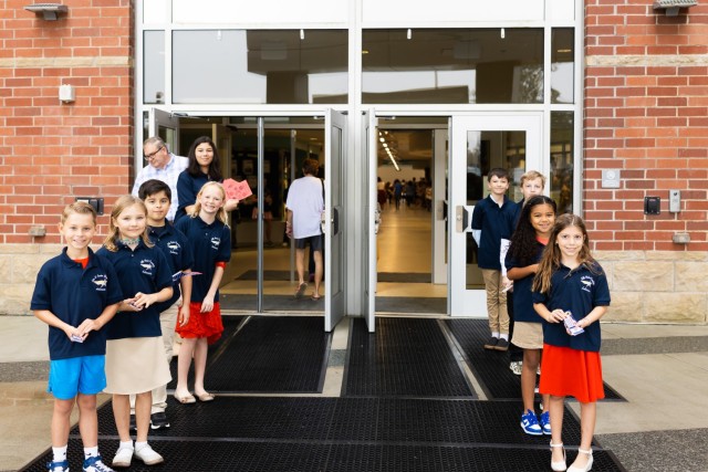 Ellis D. Parker Elementary School student ambassadors greet Fort Novosel veterans and their families before the annual Veterans Day Program Nov. 7, 2024.