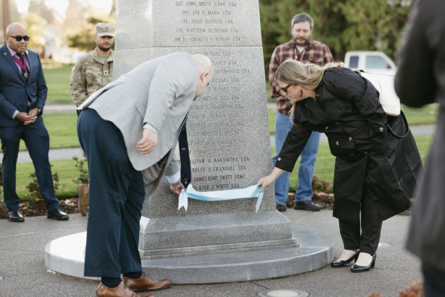 John Pestinger and Sarah Macleod unveil recent Medal of Honor recipients at the Washington State MoH monument, November 6, 2024.