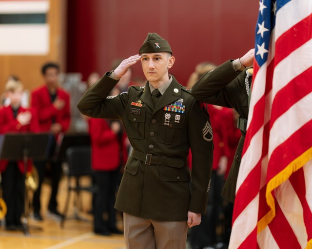 Joshua Minchew salutes during the national anthem at Washington Middle School, Nov. 7, 2024.