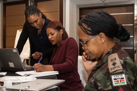 U.S. Army Lt. Col. Teisha Barnes, left, and U.S. Army Capt. Iesha Taylor, both civil affairs officers and Women, Peace and Security advocates with U.S. Army Southern European Task Force, Africa (SETAF-AF), work with their Kenyan Defence Force...