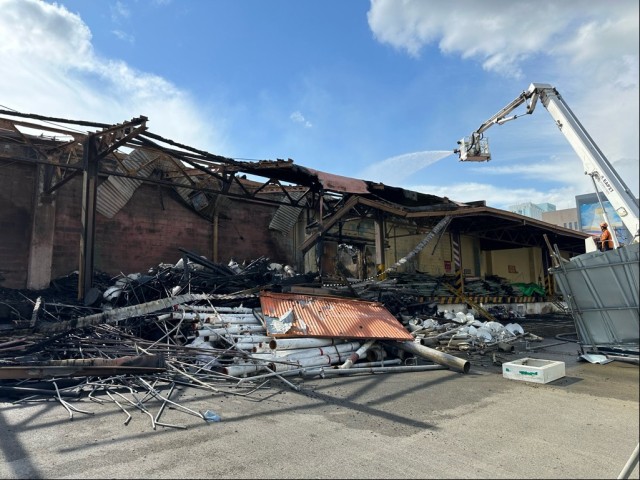 Busan, South Korea - Heroic efforts by Korean and American firefighters ensured that damage from a large fire at the Busan Storage Center, October 24, 2024, was limited to a single building at the facility.