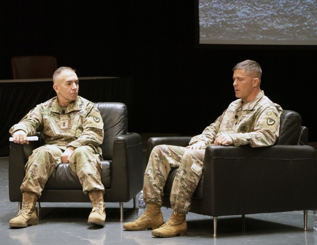 Maj. Gen. Michael B. Lalor, commanding general of U.S. Army Tank-automotive and Armaments Command, and TACOM Chaplain Lt. Col. Michael DeRienzo talk at a suicide prevention and awareness session.