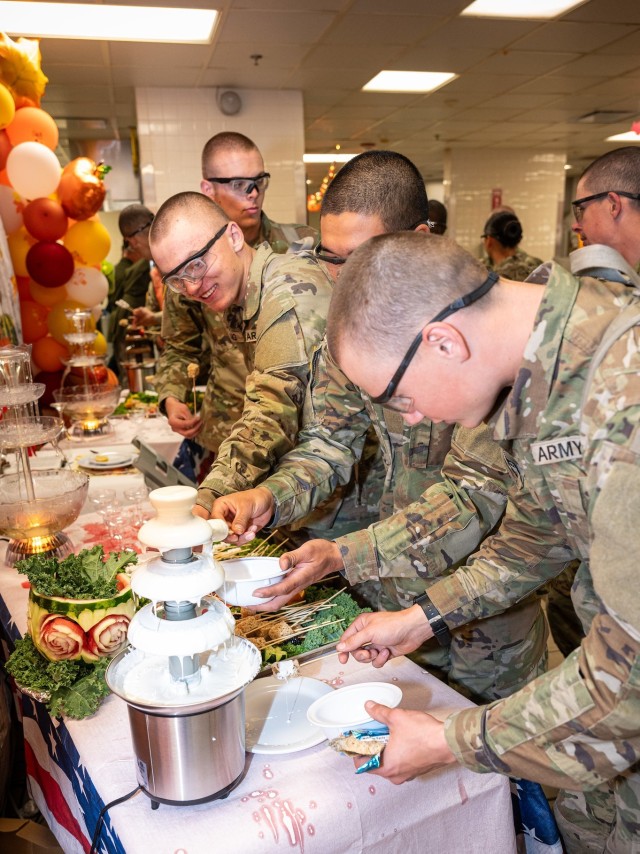 Soldiers enjoy a special treat at the dessert table as they celebrate Thanksgiving 2023 in one of Fort Leonard Wood's Army Warrior restaurants.