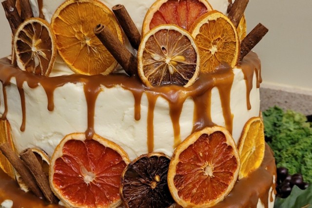 Decorations surround a cake as part of a Thanksgiving celebration at Fort Carson in Colorado Springs, Colorado. Culinary experts work around the clock each year to make creations such as this for a Thanksgiving feast for Soldiers, Family members,...