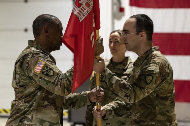 Alaska Army National Guardsmen assigned to the 208th Construction Management Team execute a change of command and deployment ceremony at the National Guard Armory on Joint Base Elmendorf-Richardson Nov. 14, 2024. The 208th will deploy in December to the CENTCOM area of responsibility to oversee military construction projects while providing quality assurance and assessing safety procedures. (Alaska National Guard photo by Seth LaCount)