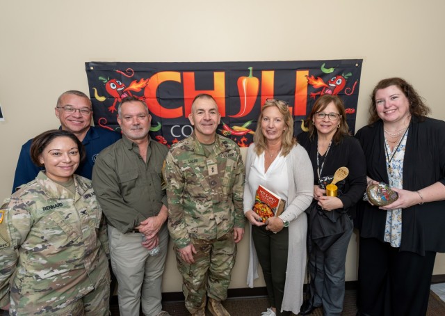 TACOM Chief of Staff Col. Lisa Rennard, ILSC Executive Director Mark Colley, Deputy to the Commander Brian Butler, Maj. Gen. Michael B. Lalor and winners Heather Manor, Annette Lozen and Mandy Jones.