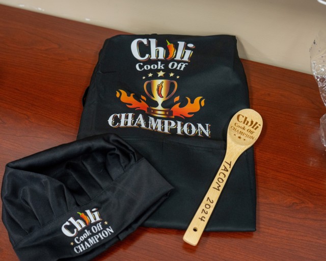The top prize in the Nov. 13, 2024 TACOM chili cookoff at the Detroit Arsenal included a hat, apron and wooden spoon.