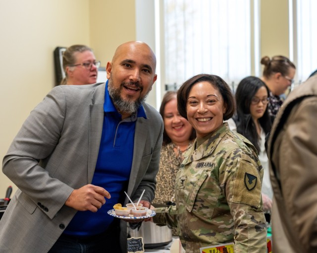 Ahmed Mawari, deputy chief of staff for logistics, engineering and environmental and Chief of Staff Col. Lisa Rennard at the TACOM chili cookoff at the Detroit Arsenal.