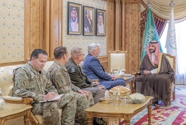 Indiana Gov. Eric Holcomb, center, and Maj. Gen. Dale Lyles, Indiana National Guard adjutant general, met with the Minister of Defense for the Kingdom of Saudi Arabia, His Royal Highness Khalid bin Salman, right, Nov. 18, 2024, to discuss shared interests and how the partnership will benefit the National Guard and the Kingdom of Saudi Arabia. 