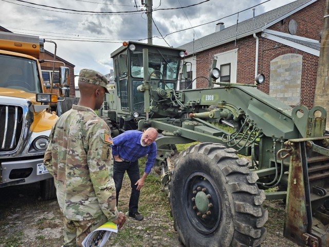 PICATINNY ARSENAL, N.J. - Anthony Di Iorio, Chief, Operations and Maintenance, Picatinny Arsenal’s Directorate of Public Works, briefs Lt. Col. Craig A. Bonham II, Picatinny Arsenal Garrison Commander, on the installation’s fleet of...