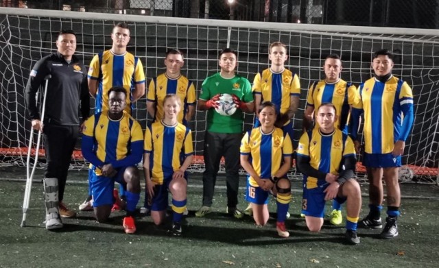 The USAG Italy soccer included Coach Raul Vargas-Romero, Team Captain/ Sgt. Kevin Alejandro Navas #10, Goalie/ Spc. Jair Campos-Ramirez #51, Pfc. Adam Thorndike #11, Pfc. Kyle Hofer #15, Staff Sgt. Benson Augustin #5, Sgt. 1st Class Jon Nicolas...