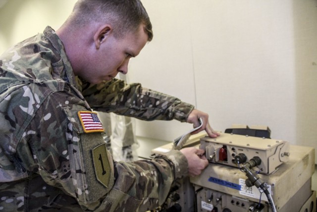 Sgt. Jacob Butcher, a squad leader for Company A, 1st Battalion, 18th Infantry Regiment, 2nd Armored Brigade Combat Team, 1st Infantry Division, troubleshoots the DUKE version 3 system, Sept. 11 during the testing portion of the Counter...