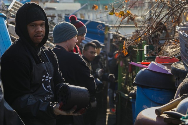 Camp Casey volunteers warm homes during holiday season