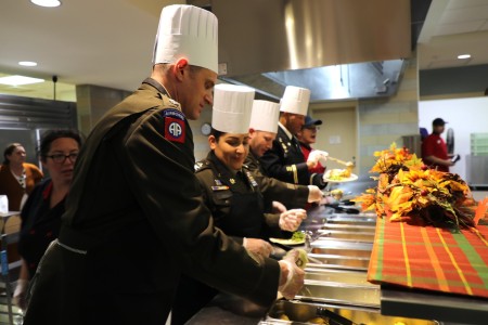 Soldiers and civilians gathered for the 2024 Thanksgiving meal on November 6 at Dining Facility 1362, Fort McCoy, Wisconsin. The feast featured traditional Thanksgiving staples served by &#34;celebrity&#34; servers, including Garrison Deputy Commander Lt. Col. Michael Corkum, Garrison Commander Col. Sheyla Baez, 181 Commander Col. Charles Wells, 1st Sgt. Thomas Ninkovich, and Maj. Randy Downs. The event was organized by the Fort McCoy Logistics Readiness Center&#39;s Food Services Division.