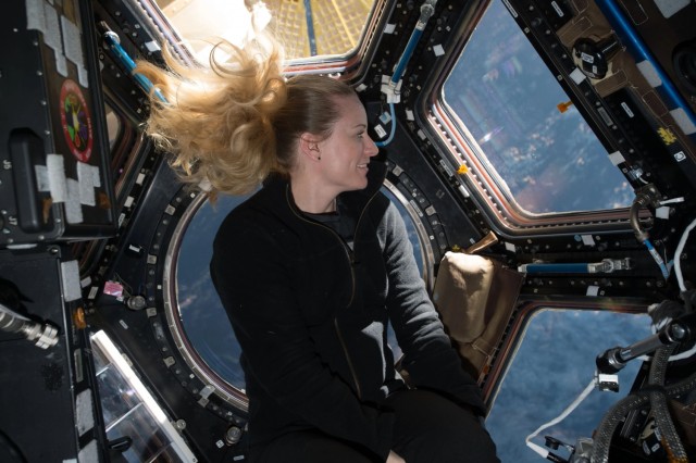 NASA astronaut Kate Rubins looks out of the windows in the International Space Station’s cupola module during Expedition 49 in 2016. Rubins, who commissioned into the Army Reserve in 2021, was awarded the U.S. Army Basic Aviation Badge with the Astronaut Device and the Basic Space Badge. Rubins is the first Army reservist  to receive the combined honor.