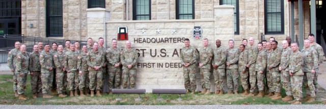 First Army unit commanders and command sergeants major gather in front of First Army headquarters on Rock Island Arsenal, Illinois, during the First Army Commanders Forum.