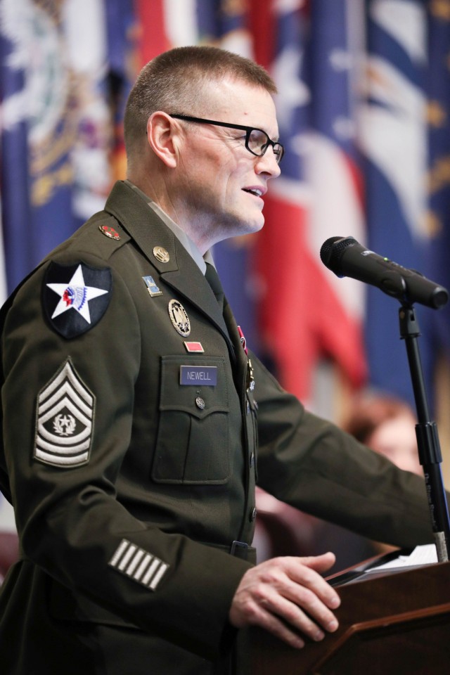 Command Sgt. Maj. Garth Newell addresses senior leaders, family and friends during his retirement ceremony Nov. 21 at Thurman Auditorium on Fort Belvoir. He last served as garrison command sergeant major from May 19, 2023, until Sep. 12, 2024.