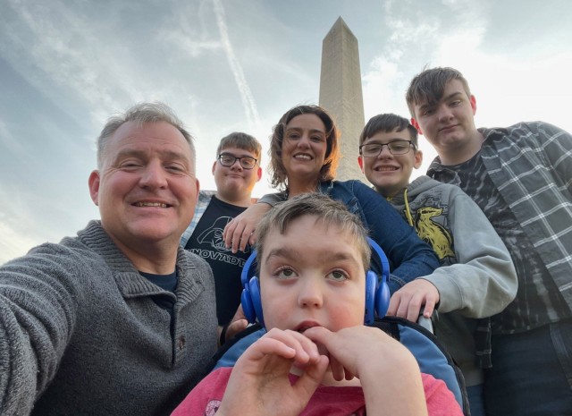 Lt. Col. Tony Messenger, 3rd Squadron commander, Second Security Forces Assistance Brigade, Fort Liberty, North Carolina, his son, Connor, 18, wife, Amy, Liam, 16, Colin, 14, and Keegan (center), 12, stop for a quick selfie during a visit to Washington, D.C., to receive an award for being the Association of the United States Army’s Volunteer Family of the Year Oct. 13. (Courtesy photo)