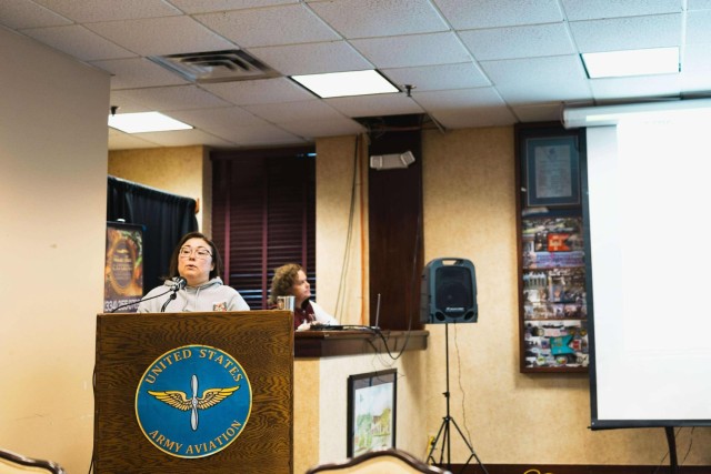 Sarah Smith, Lyster Army Health Clinic EFMP coordinator, informs the community about EFMP services provided to Fort Novosel families as the guest speaker during the LINC meeting at The Landing Dec. 5.