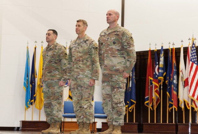 Col. Marcus Hunter, center, commander of U.S. Army Garrison Japan, stands with Command Sgt. Maj. David A. Rio, left, and Command Sgt. Maj. Rick Meeker during a change of responsibility ceremony at Camp Zama, Japan, Dec. 12, 2024. Rio, who plans to take a position at Fort Gregg-Adams, Virginia, relinquished responsibility of the garrison&#39;s senior enlisted leader role to Meeker. 