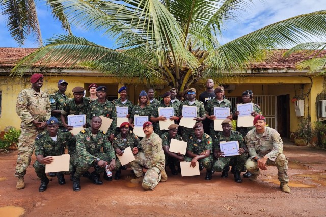 From left to right, U.S. Army Sgt. 1st Class Ryan Hill, civil affairs team sergeant, U.S. Army Sgt. William Larson, civil affairs team medic, Staff Sgt. Tyrone Thompson, civil affairs team sergeant and U.S. Army Capt. Dru Simpson, civil affairs...