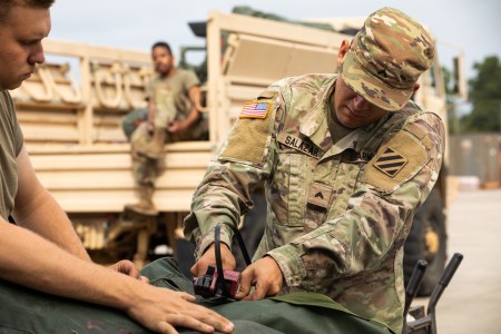 U.S. Army Soldier assigned to the 2nd Brigade Armored Combat Team, 3rd Infantry Division, seals excess equipment during a Rapid Removal of Excess turn in, at Fort Stewart, Georgia, Sep. 5, 2024. The R2E program allows Soldiers to turn in any...