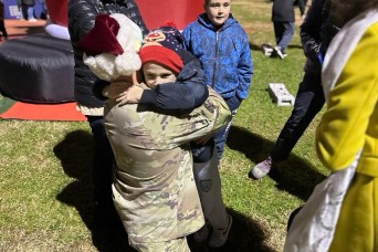 U.S. Army Garrison Italy tree lighting offers special moment for Italian boy