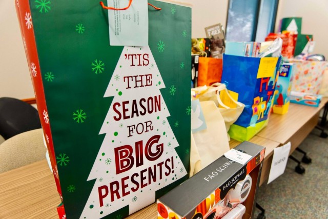 Gifts are organized by unit before distribution for the 2024 Fort Novosel Angel Tree project Dec. 19.