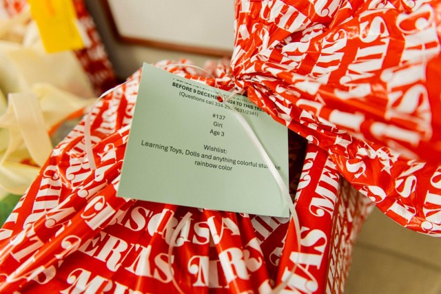 Gifts tags show description of gender, age, and wish list for each child during the 2024 Fort Novosel Angel Tree project Dec. 19.