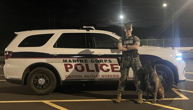 Military Working Dog, Dino, with his handler.