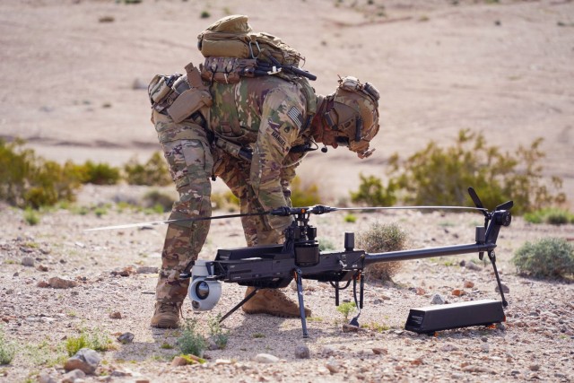 A robotics and autonomous systems platoon sergeant assembles the Ghost-X UAS during Project Convergence Capstone 4.