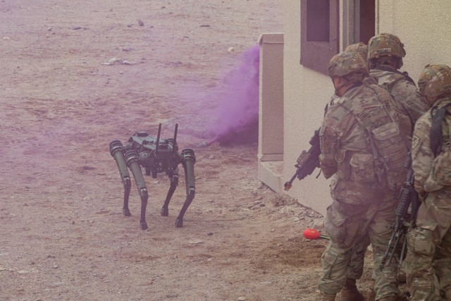 Soldiers assigned to the 1st Battalion, 29th Infantry Regiment take part in a human-machine integration experiment using the Ghost Robotic Dog during Project Convergence - Capstone 4 on 17 March 2024.