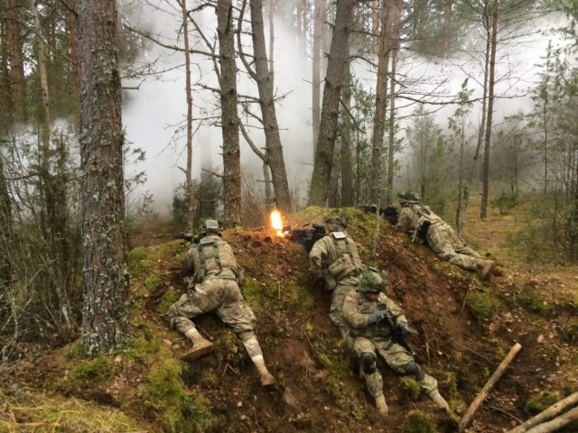 Paratroopers from 2-503rd IN engage opposing forces during Exercise Iron Sword 16 in Pabrade Training Area, Lithuania.