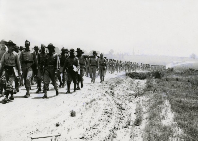 Student officers at the Infantry School at Fort Benning (now Fort Moore), GA, in 1941 move from one field problem to another.