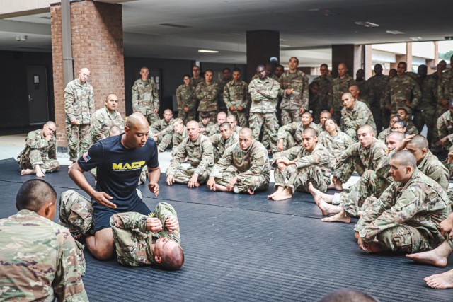 Soldiers with Charlie Company, 2nd Battalion, 58th Infantry Regiment learn modern Army combatives on September 27, 2023 on Sand Hill, Ga. The objective of the U.S. Army combatives is to train Leaders and Soldiers in close quarters combatives in...