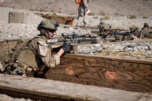 Marines with the 2nd Marine Division provide suppressive fires while conducting platoon attacks during an integrated training exercise at the Marine Corps Air Ground Combat Center on 19 July 2024.