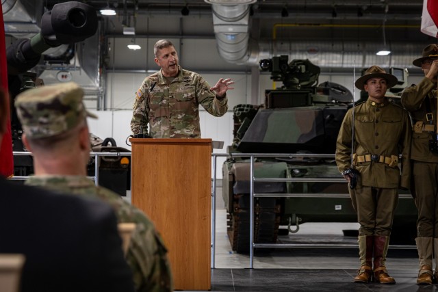 U.S. Army Brig. Gen. John “Brad” Hinson, commander of the U.S. Army Sustainment Command speaks during a colors uncasing ceremony at the Army Prepositioned Stocks work site on September 18, in Powidz, Poland. The Army Field Support...