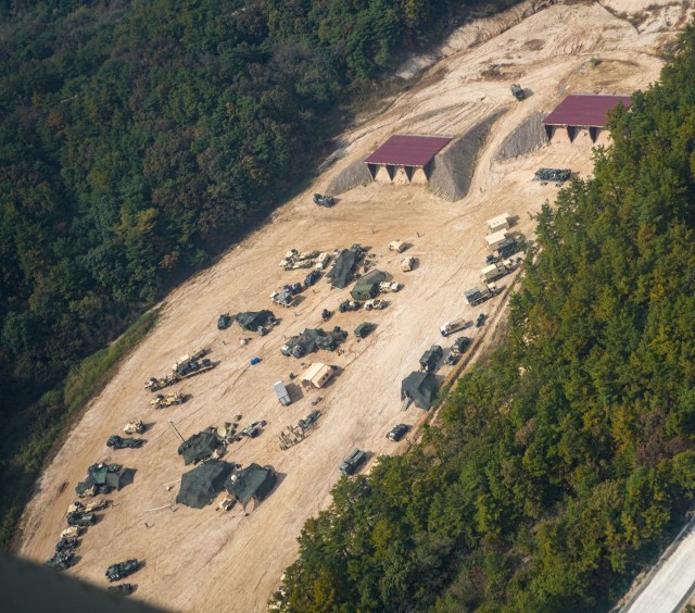 Aerial view of Base Cluster Hammer located in the southeastern portion of Rodriguez Life Fire Complex. Base Cluster Hammer consisted primarily of HHC, C CO, and B CO of 704BSB. Taken at the Rodriguez Life Fire Complex, Pocheon, South Korea, in...