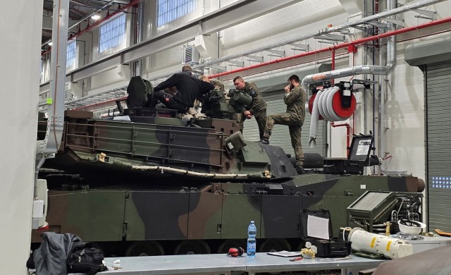Poland Provided Logistic Support personnel from the Polish military’s 33rd Army Prepositioned Stocks Battalion receive training on the M1A2 SEPv3 Abrams main battle tank from training facilitators from U.S. Army Tank-automotive and Armaments...