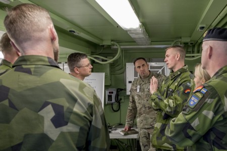 Swedish military staff officers meet with leaders of the New York Army National Guard’s 42nd Infantry Division at Fort Indiantown Gap, Pennsylvania, during a command post exercise Nov. 21, 2024. The command post exercise was one of three held to...