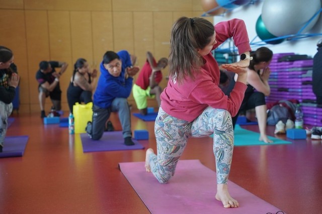 A participant engages in a yoga class during Fitness Day, Jan. 11, 2025, at Tower Barracks, Germany.