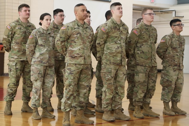 Soldiers stand in formation during a mobilization ceremony for the 634th Brigade Support Battalion Forward Logistics Element Jan. 20, 2025, at the Illinois Army National Guard&#39;s Readiness Center in Sullivan. The unit, with just over a dozen Soldiers, will support logistics for U.S. Army Europe and Africa.  